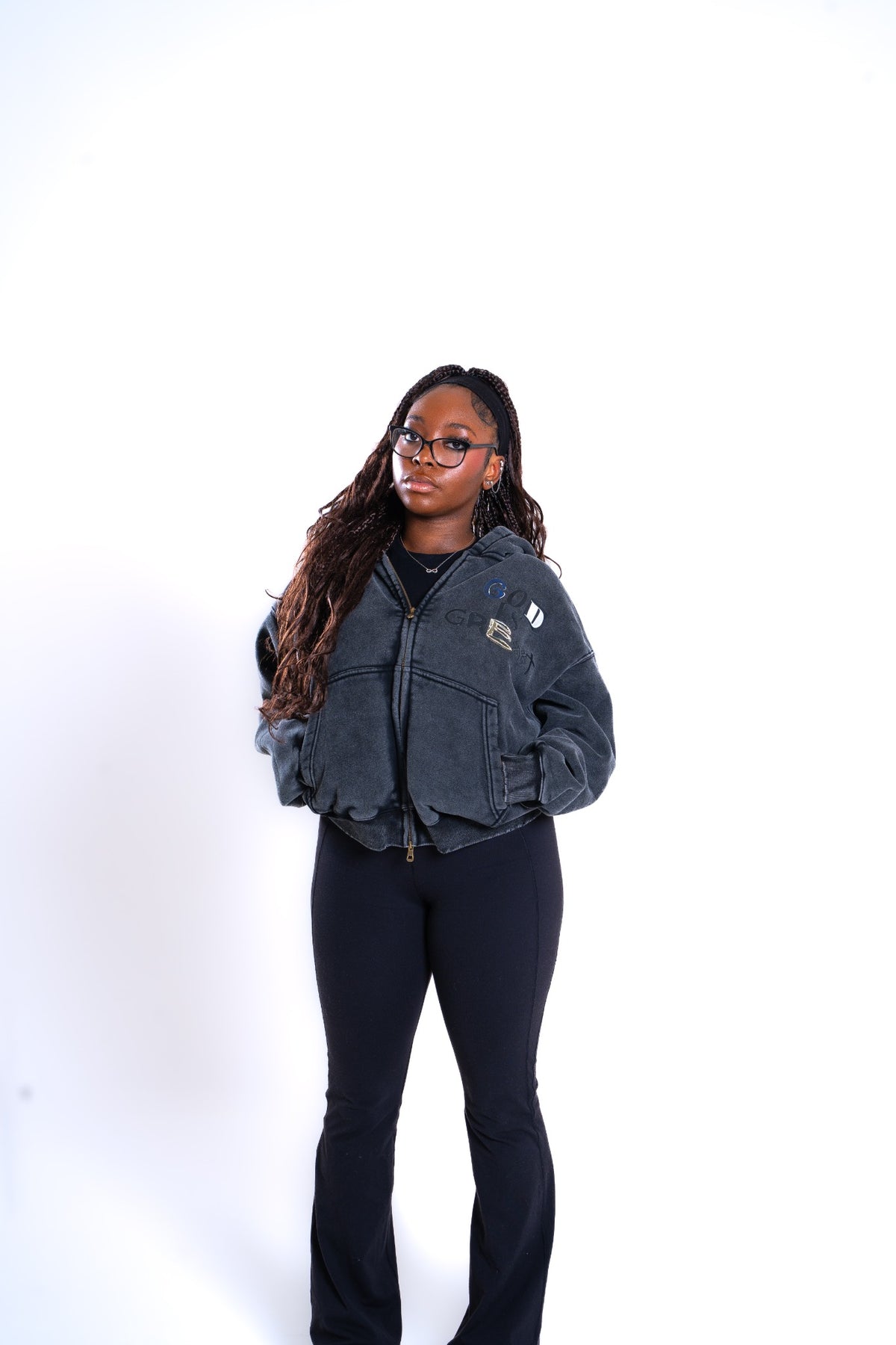 OnBaraka womens campaign model wearing the Creed Noir Zip