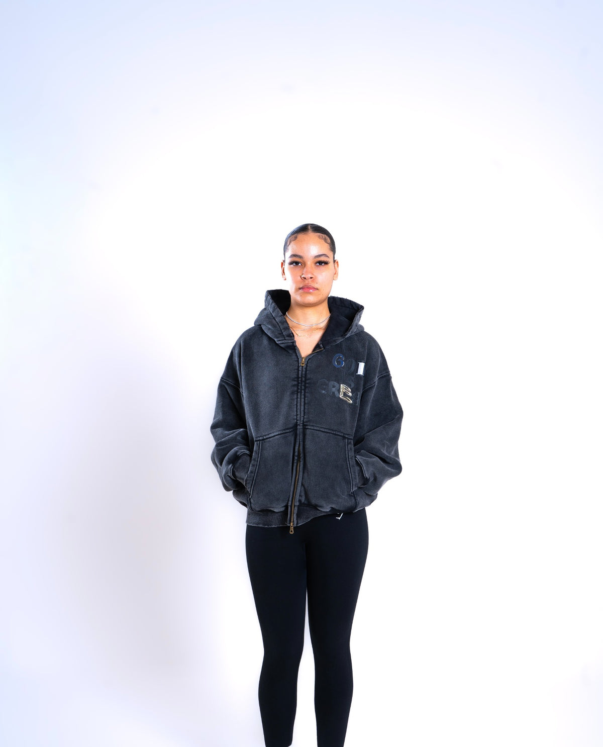OnBaraka womens campaign model wearing the Creed Noir Zip